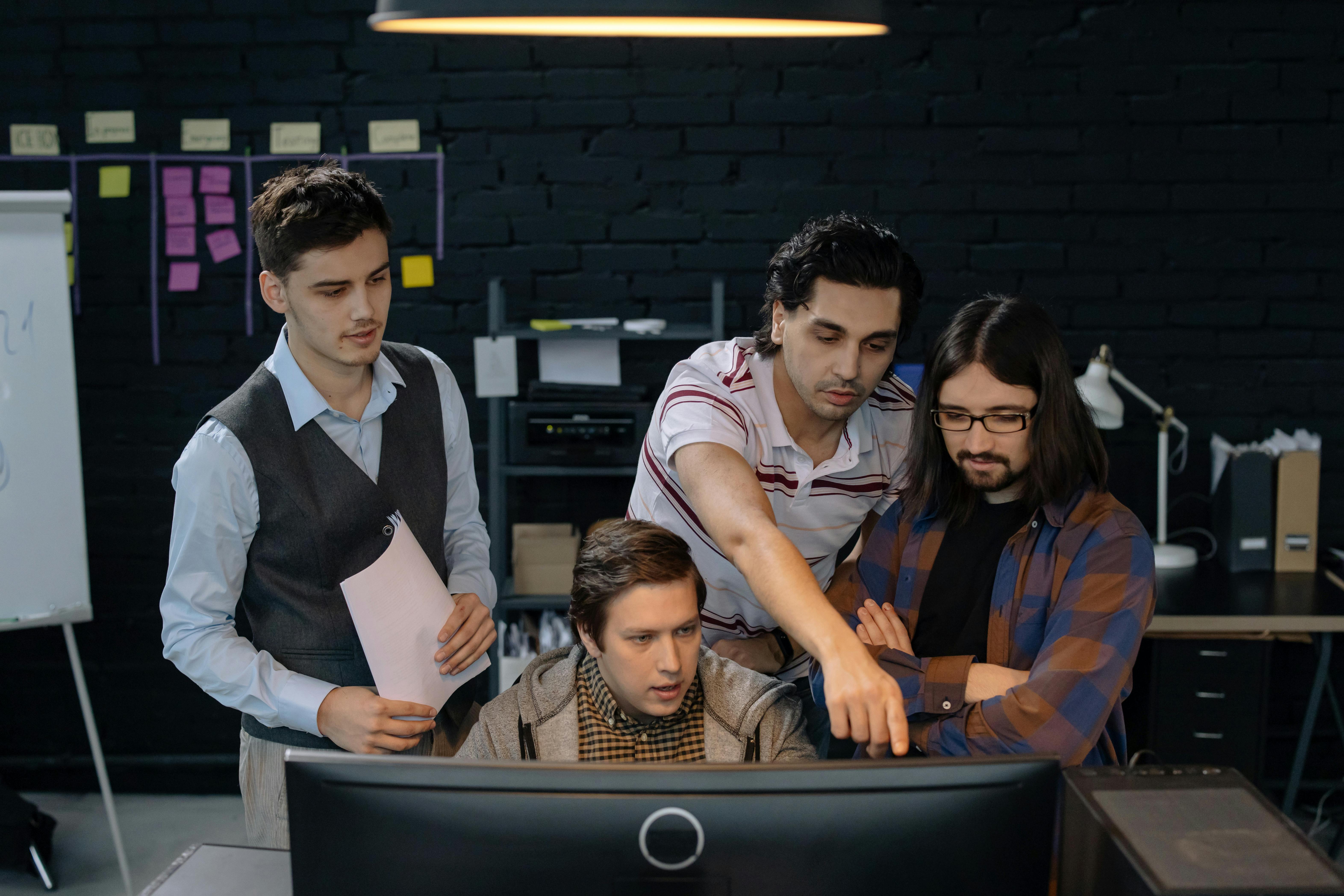 Team of engineers working on software upgrade